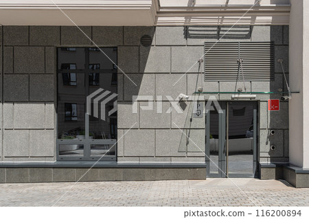 Facade of a modern residential building, building texture 116200894