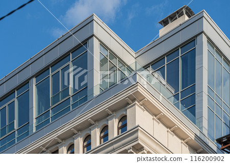 Facade of a modern residential building, building texture 116200902