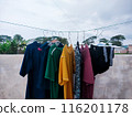 clothes hanging on the clothesline 116201178