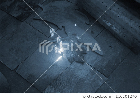 Laser cleaning of metal. The laser beam cleans the metal surface from rust. Laser removes removing old rust from metal. Innovation metalworking. New technologies Laser cleaning of metal. The laser beam cleans the metal surface from rust. Laser removes removing old rust from metal. Innovation metalworking. New technologies 116201270