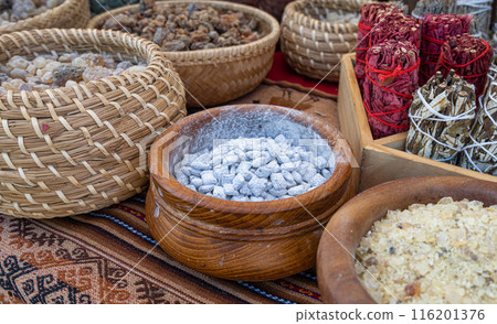 Natural incense sticks, herbal bundles, white resin. Aromatic dried herbs, traditional ritual items 116201376