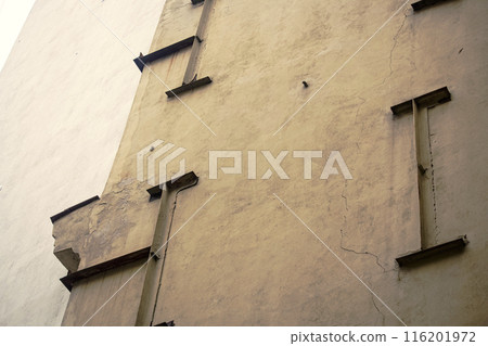 Abstract construction wall at an interesting angle from bottom up 116201972