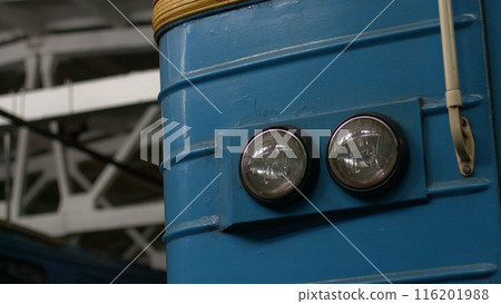 Old retro wagon with round headlights. Depot for old subway trains. Old retro wagon with round headlights. Depot for old subway trains. 116201988