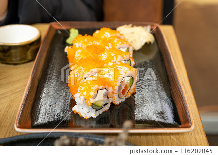 Maki Sushi, California Rolls with Cucumber, Avocado, Raw Fish and Red Tobiko Caviar, Makizushi 116202045