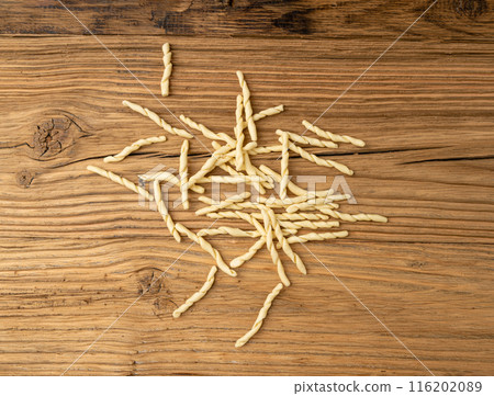 Raw Trofie Pasta, Dry Italian Macaroni, Traditional Genoa Food, Raw Noodle, Modern Ligurian Cuisine Raw Trofie Pasta, Dry Italian Macaroni, Traditional Genoa Food, Raw Noodle, Modern Ligurian Cuisine 116202089