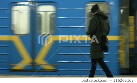 Subway cars arrive at the station. Underground transport. Passenger on the station. 116202162