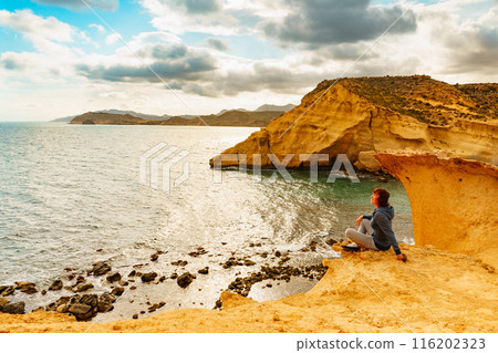 Woman on Cocedores Beach, Spain Woman on Cocedores Beach, Spain 116202323