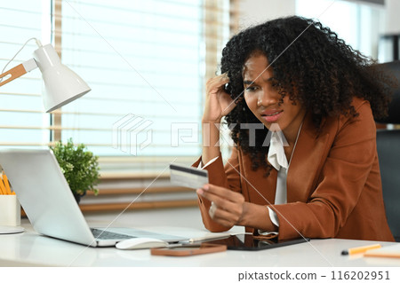 Confused African American woman have troubles credit card, transaction failed or debt Confused African American woman have troubles credit card, transaction failed or debt 116202951