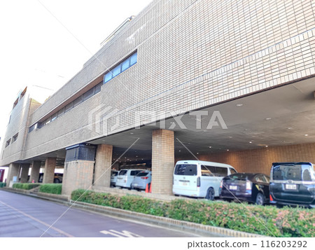 Parking lot on the first floor of the hotel 116203292