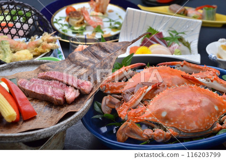 A colorful dinner course featuring a fusion of fresh crab and beef 116203799