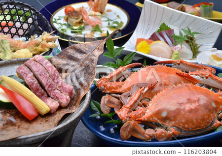 A colorful dinner course featuring a fusion of fresh crab and beef 116203804