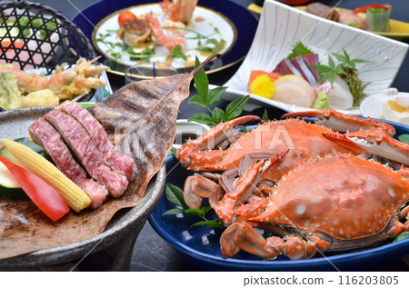 A colorful dinner course featuring a fusion of fresh crab and beef 116203805