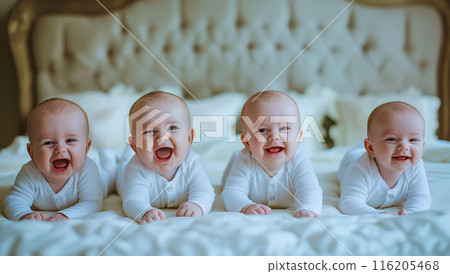 A group of smiling baby toddlers is in the bed, giggling and cheerful. The concept of innocence, joy, happiness, and the pure delight of childhood. Generative AI. 116205468