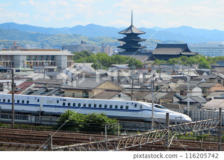 View from the rooftop observation deck of the Kyoto Railway Museum: N700 series Shinkansen and Toji Temple's five-story pagoda View from the rooftop observation deck of the Kyoto Railway Museum: N700 series Shinkansen and Toji Temple's five-story pagoda 116205742