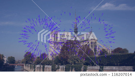 Image of blue fireworks over cityscape of notre dame and trees 116207014