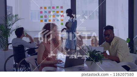 Image of graph icon spinning against diverse man and woman discussing over a document at office 116207580