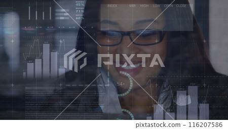 Image of infographic interface over smiling african american woman working on laptop in office Image of infographic interface over smiling african american woman working on laptop in office 116207586