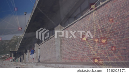 Image of connected icons globe over african american man running beside brick wall Image of connected icons globe over african american man running beside brick wall 116208171