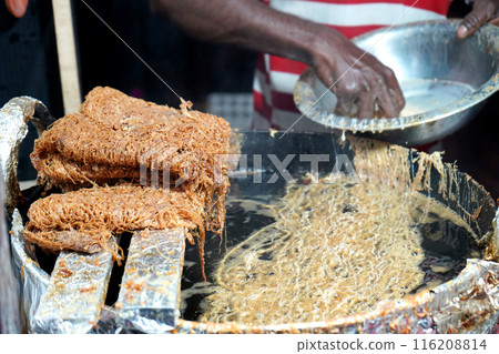 Preparing fish kabiraji at Food Festival 116208814