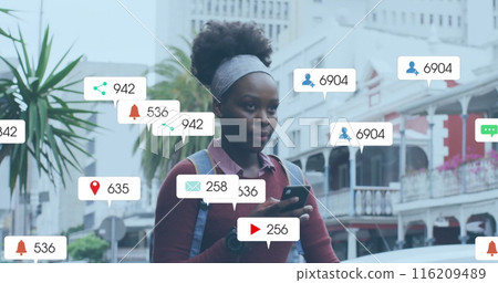 Image of social media data processing over african american woman using smartphone Image of social media data processing over african american woman using smartphone 116209489