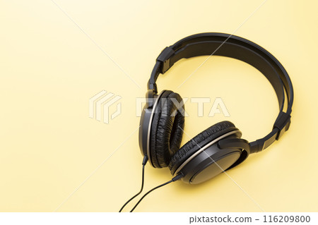 Headphones on a yellow background 116209800
