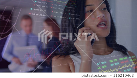 Image of graphs and trading board over beautiful biracial woman talking on smartphone Image of graphs and trading board over beautiful biracial woman talking on smartphone 116210468