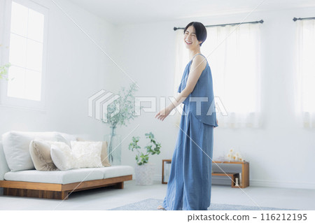 Woman in blue camisole Woman in blue camisole 116212195