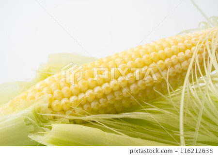 Peeled young corn close-up Peeled young corn close-up 116212638