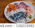 A plate of delicious seafood sashimi 116213082