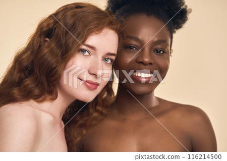 Two Diverse Women Embracing Natural Beauty and Friendship 116214500
