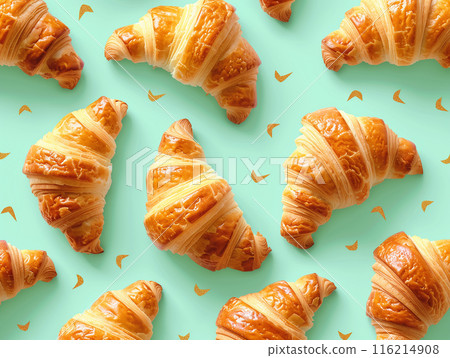 Delicious golden croissants arranged on a pastel green background, creating a vibrant and appetizing visual contrast. Delicious golden croissants arranged on a pastel green background, creating a vibrant and appetizing visual contrast. 116214908