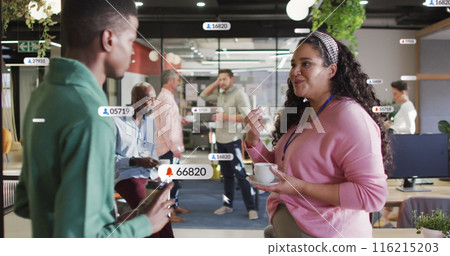 Image of social media data processing over diverse business people in office Image of social media data processing over diverse business people in office 116215203