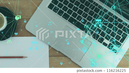 Image of globes of digital icons over close up of a laptop and coffee cup on wooden surface 116216225