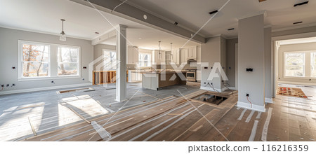 Demolishing a wall to create an open floor plan in home renovation 116216359