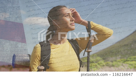 Image of american flag over biracial woman looking away in mountains Image of american flag over biracial woman looking away in mountains 116216647