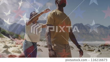 Image of american flag over smiling diverse couple carrying in mountains Image of american flag over smiling diverse couple carrying in mountains 116216673
