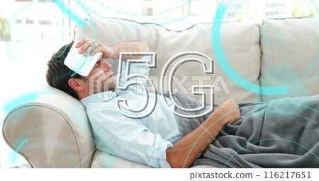 Image of 5G text with circles and scopes scanning over sick man lying on sofa in the background Image of 5G text with circles and scopes scanning over sick man lying on sofa in the background 116217651