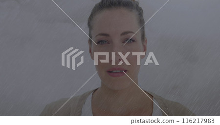 Image of caucasian female medical professional in her early thirties looking directly at camera 116217983