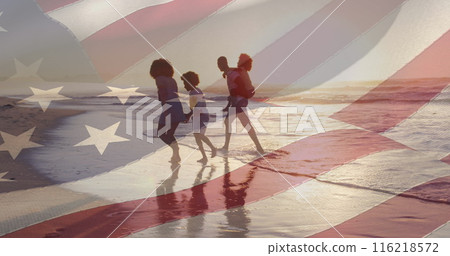 Image of flag of united states of america over african american family on beach Image of flag of united states of america over african american family on beach 116218572