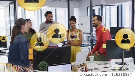 Image of media icons over happy diverse busines people discussing in office 116218584