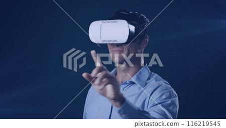 Image of caucasian man wearing vr headset over dark background 116219545