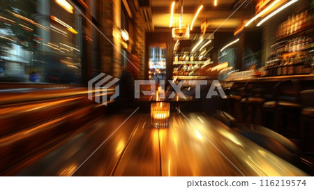 Candle is lighting empty table in blurred pub interior 116219574