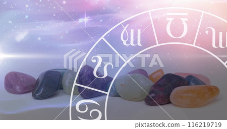 Image of stars and zodiac moving over stones on white surface, copy space 116219719