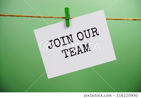 Join our team text on paper card hanging on the wall with Clothespins Join our team text on paper card hanging on the wall with Clothespins 116220930
