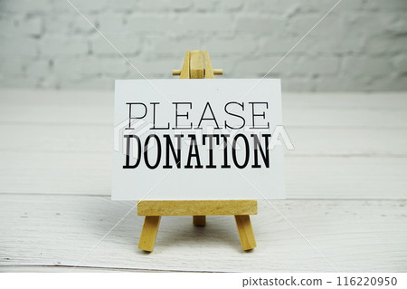 Please Donation text on paper card with wooden easel stand 116220950