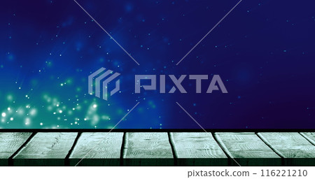 Image of lights over blue background with wooden surface 116221210