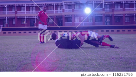 Image of glowing lights over diverse rugby players in sports stadium 116221796