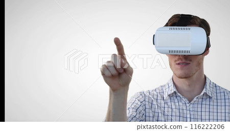 Image of caucasian man wearing vr headset gesturing against grey background with copy space Image of caucasian man wearing vr headset gesturing against grey background with copy space 116222206