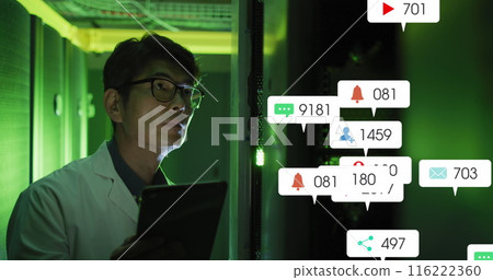 Image of social media icons over asian male engineer using digital tablet at server room Image of social media icons over asian male engineer using digital tablet at server room 116222360