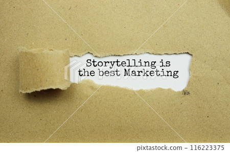 Storytelling is the best Marketing message written on white paper with torn paper background 116223375